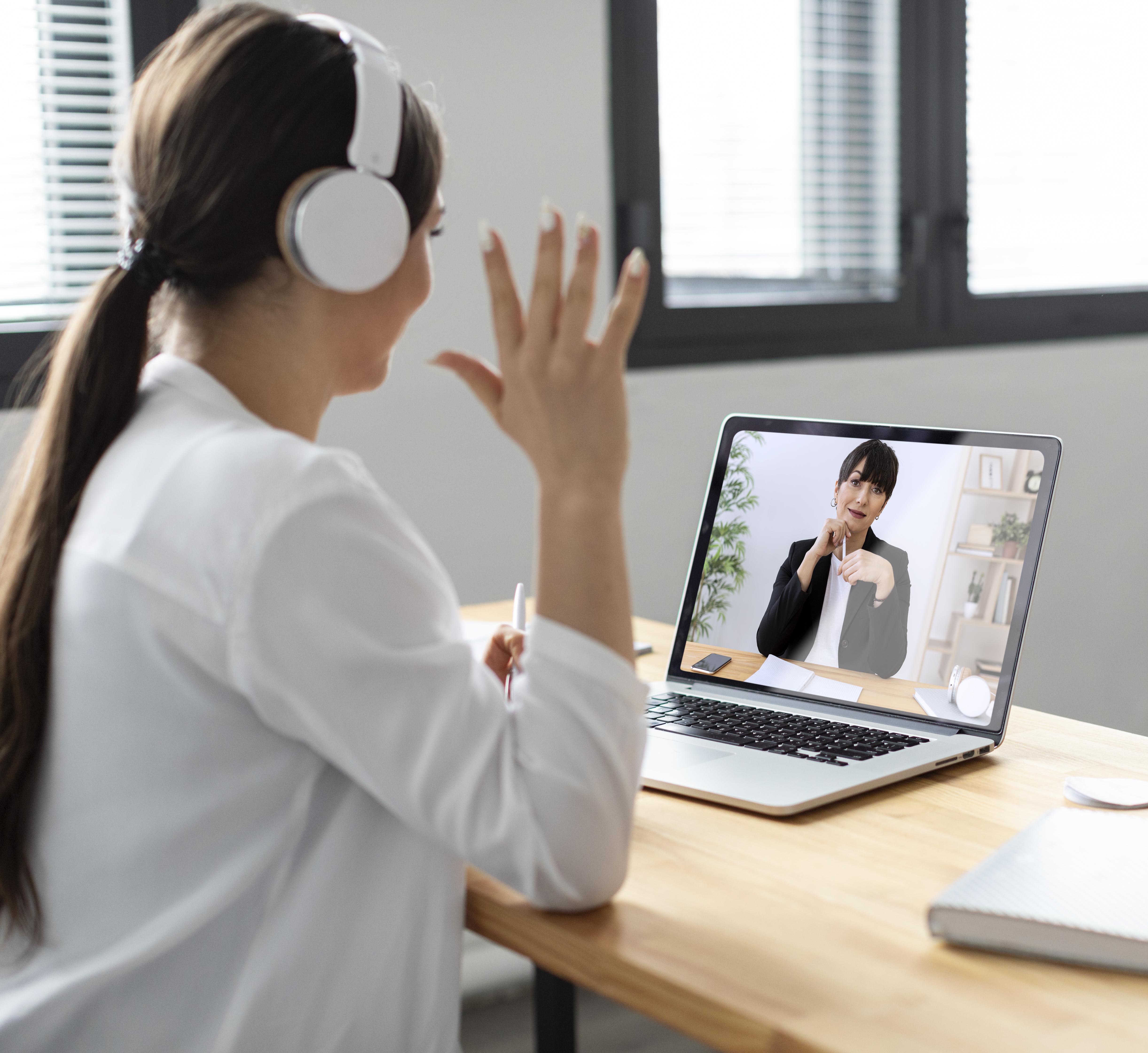 medium-shot-smiley-woman-video-call
